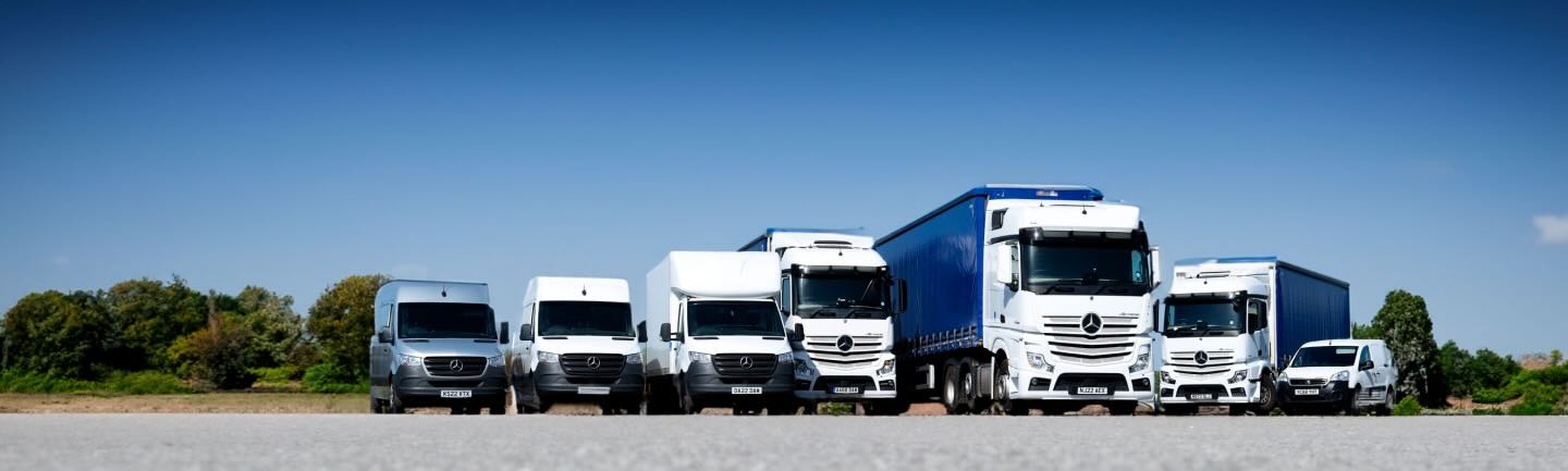Fleet of trucks, lorries and vans lined up